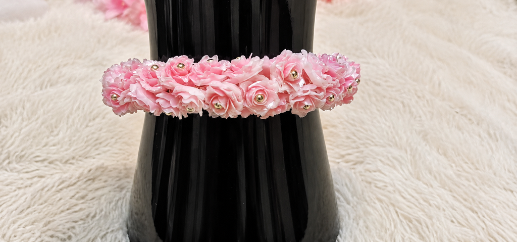 Pulsera de flores color rosa