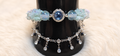 Pulsera de flores azul claro
