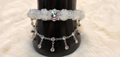 Pulsera de flores blanca con circulo