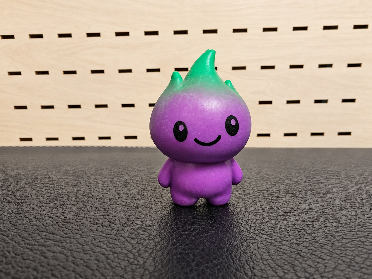 Figura decorativa de fantasma morado y verde