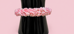 Pulsera de flores color rosa