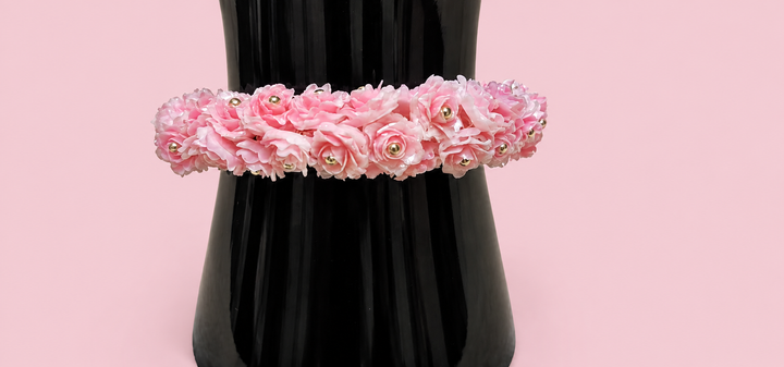 Pulsera de flores color rosa